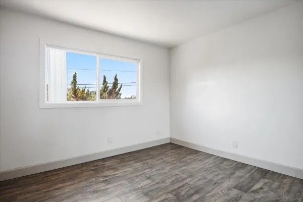 a view of a room that has a window in it