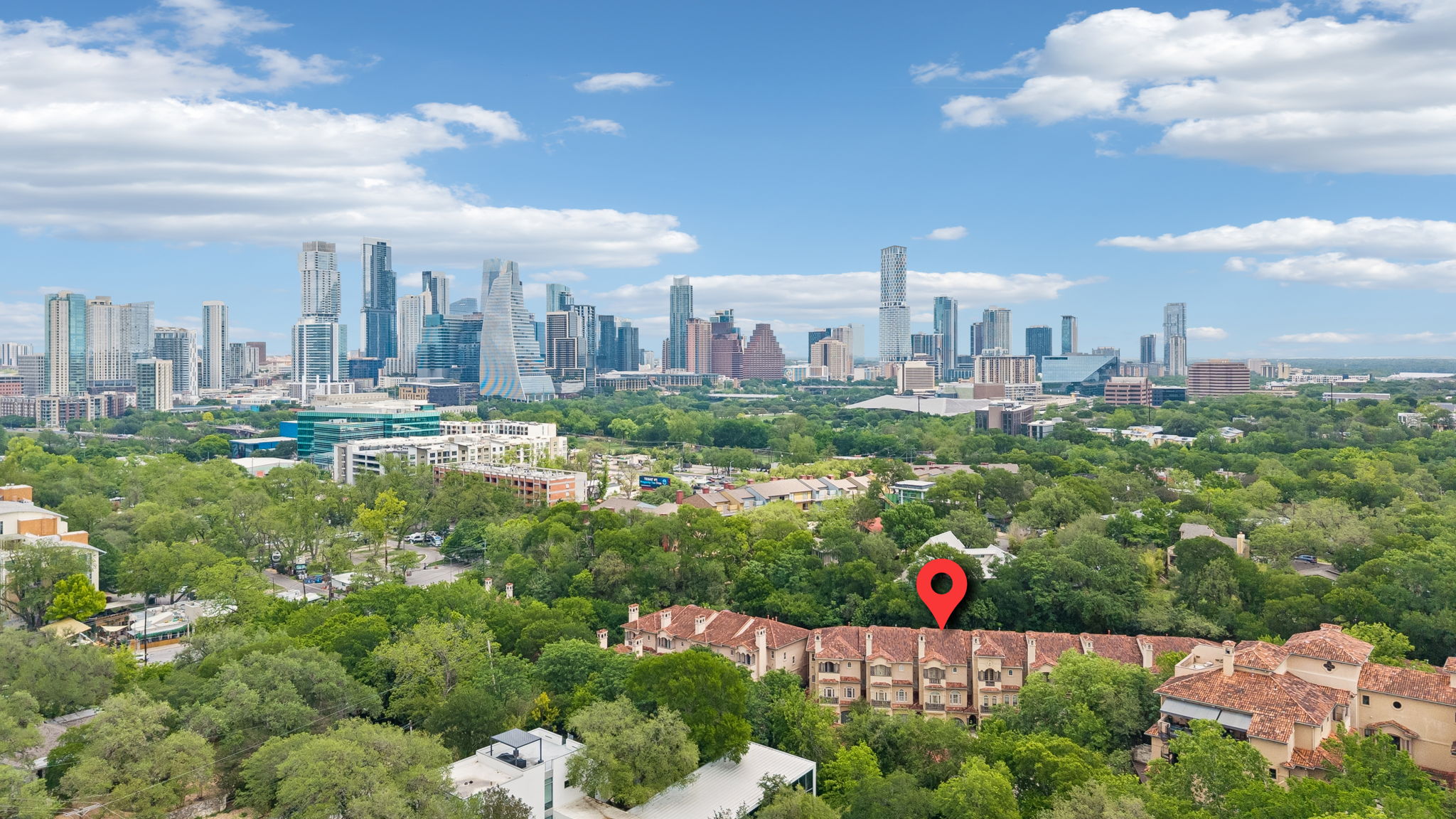 1529 Barton Springs Road, Unit 9 Austin, TX 78704 - Photo 2 of 37 Aerial view showcasing the property's location amidst lush green trees, and right on the doorstep of downtown and Zilker Park