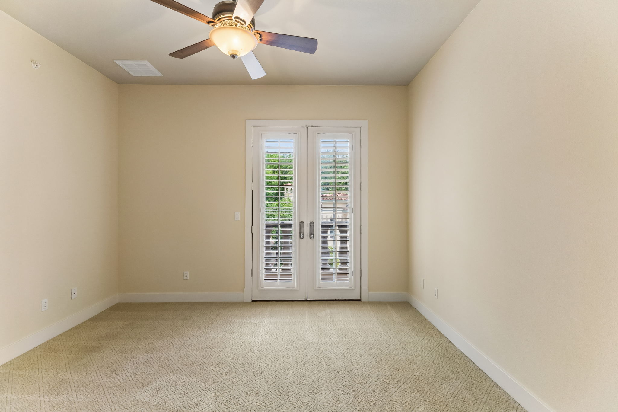 1529 Barton Springs Road, Unit 9 Austin, TX 78704 - Photo 22 of 37 Secondary Bedroom with views over the front courtyard and its own bathroom