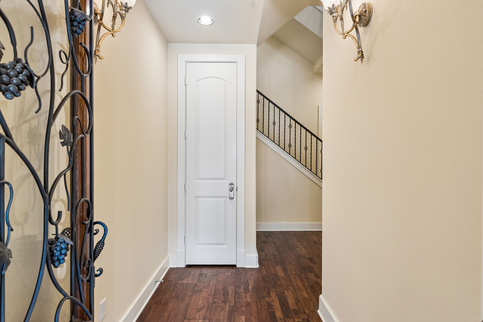 1529 Barton Springs Road, Unit 9 Austin, TX 78704 - Photo 3 of 37 Entryway with dark wood flooring, and wrought iron front door