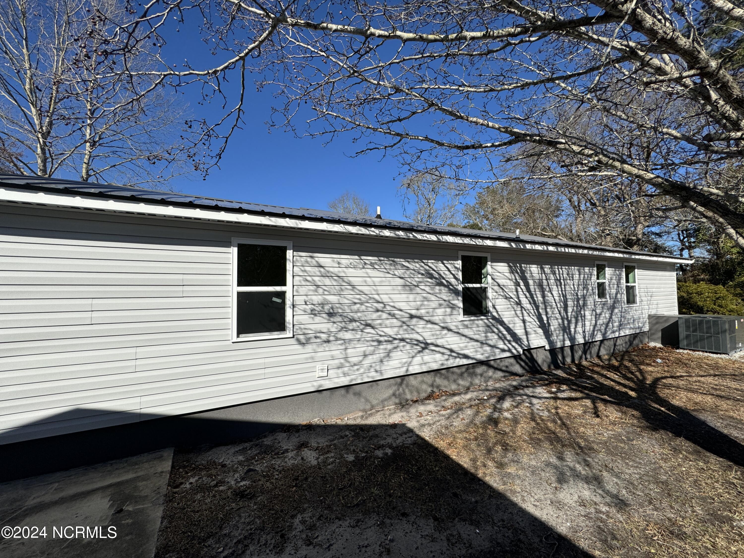 2807 Boones Neck Road Southwest Supply, NC 28462 - Photo 14 of 14 Rear