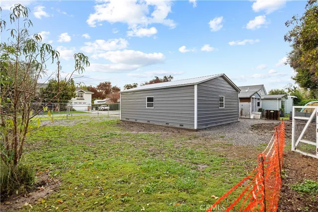a view of a playground with basketball court