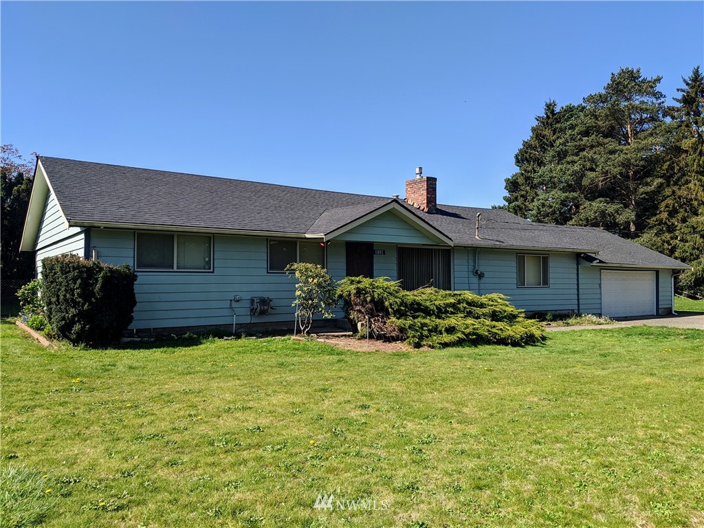 11892 Avon Allen Road Burlington, WA 98233 - Photo 1 of 1 a front view of a house with yard and green space