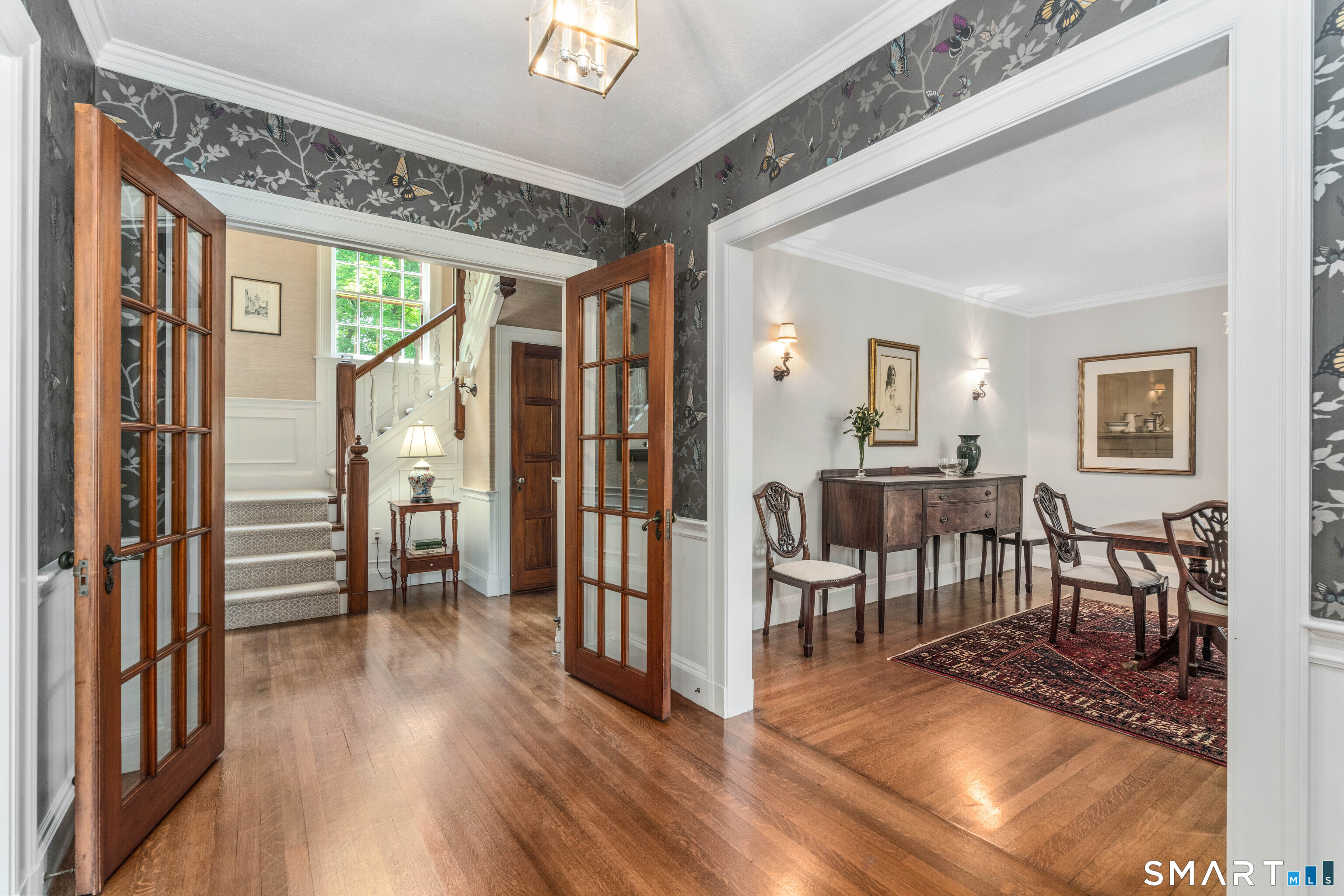 7 Fernwood Road West Hartford, CT 06119 - Photo 5 of 40 a view of a livingroom with furniture and hardwood floor
