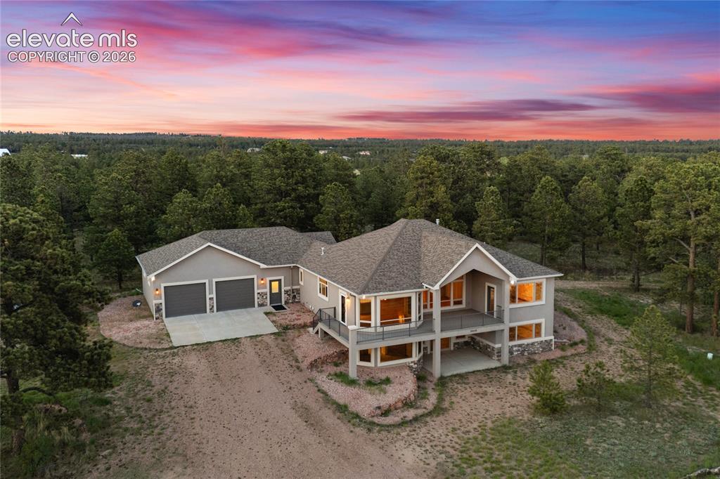 10840 Vollmer Road Colorado Springs, CO 80908 - Photo 6 of 49 an aerial view of a house with mountain view