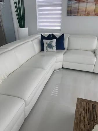 a kitchen with a stove and a refrigerator