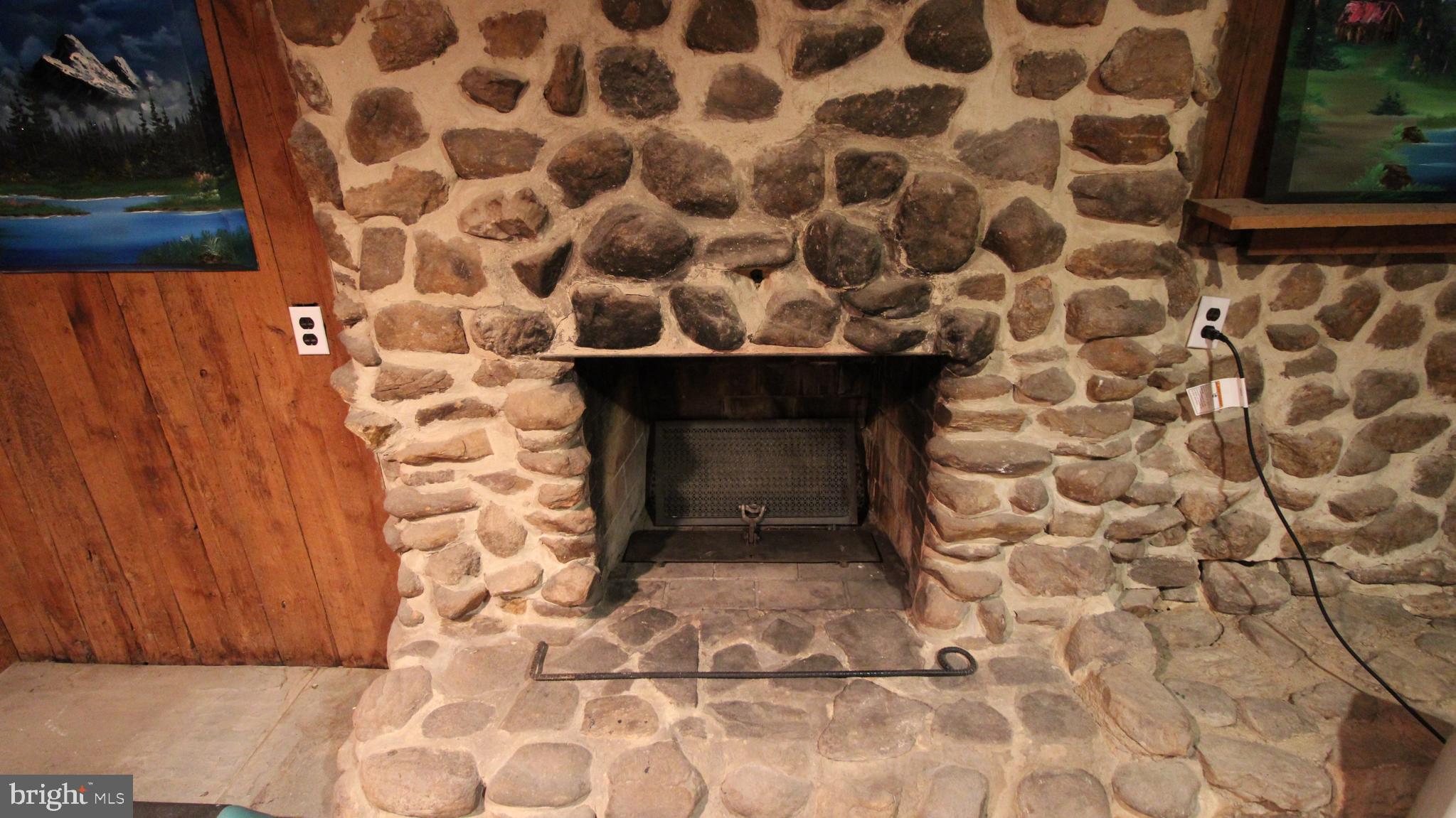 10617 Powell Road Thurmont, MD 21788 - Photo 23 of 32 Woodburning Fireplace in Basement