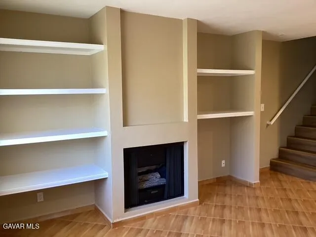 a living room with a fireplace