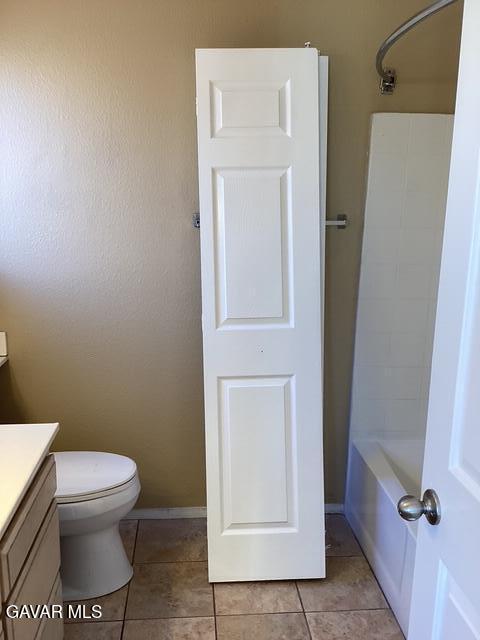 43469 30th Street West, Unit 3 Lancaster, CA 93536 - Photo 10 of 17 a white toilet sitting next to a shower