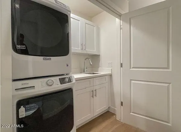 a bathroom with a sink a toilet and a bathtub
