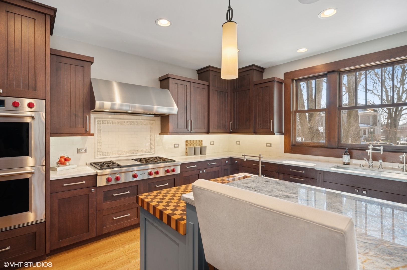 412 Central Avenue Wilmette, IL 60091 - Photo 15 of 69 a kitchen that has a sink and a stove