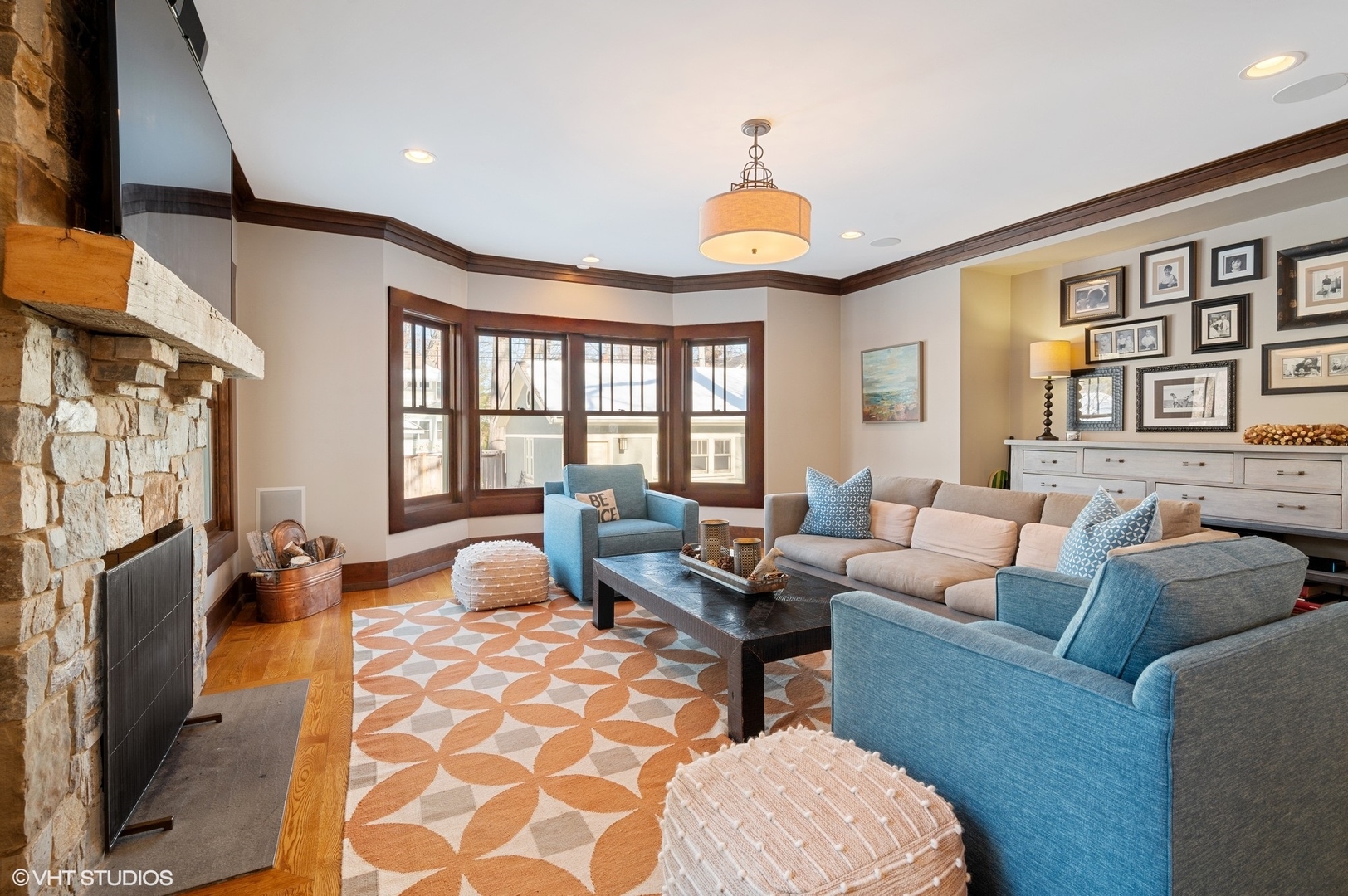 412 Central Avenue Wilmette, IL 60091 - Photo 19 of 69 a living room with furniture fireplace and a flat screen tv