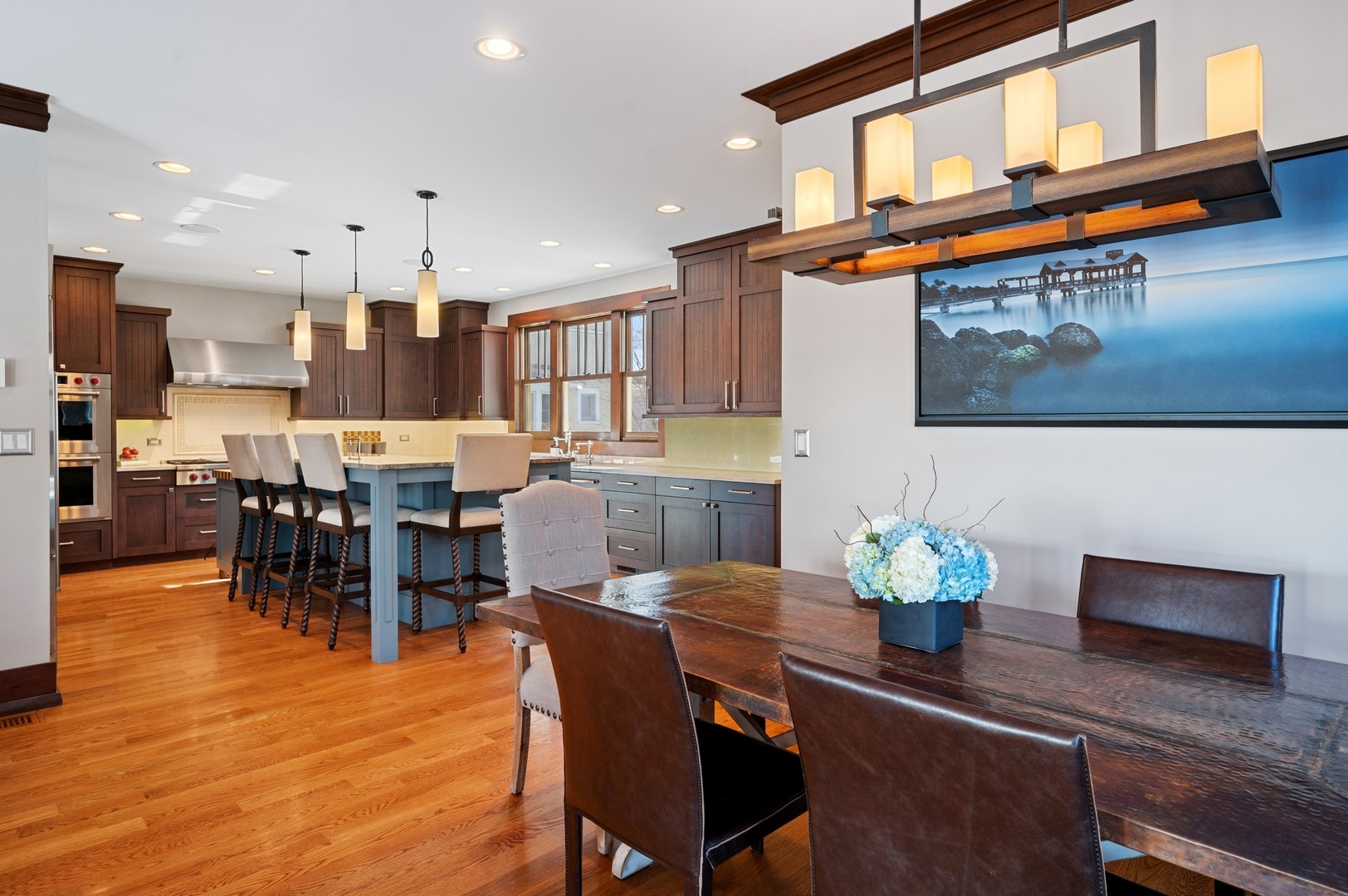 412 Central Avenue Wilmette, IL 60091 - Photo 20 of 69 a view of a dining room with furniture and wooden floor