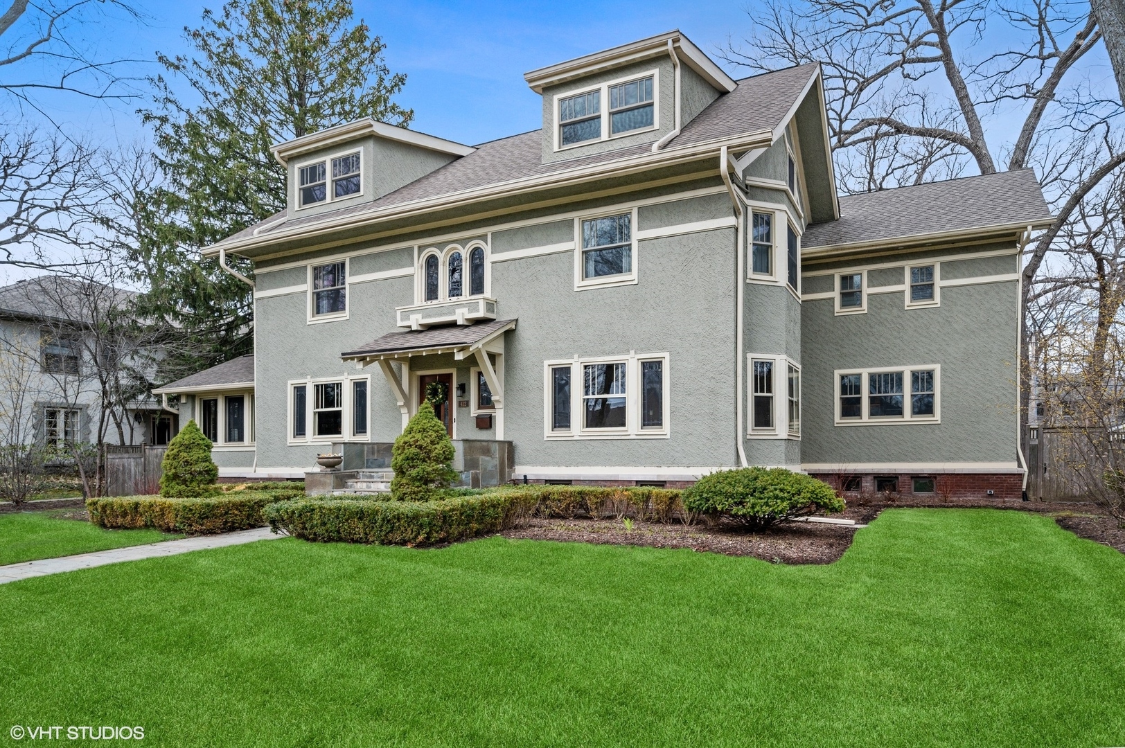 412 Central Avenue Wilmette, IL 60091 - Photo 2 of 69 a front view of house with yard and green space