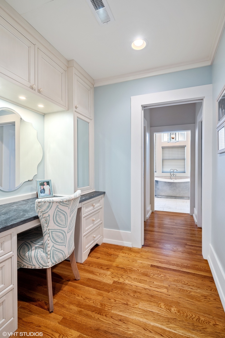 412 Central Avenue Wilmette, IL 60091 - Photo 28 of 69 a living room with furniture and a wooden floor
