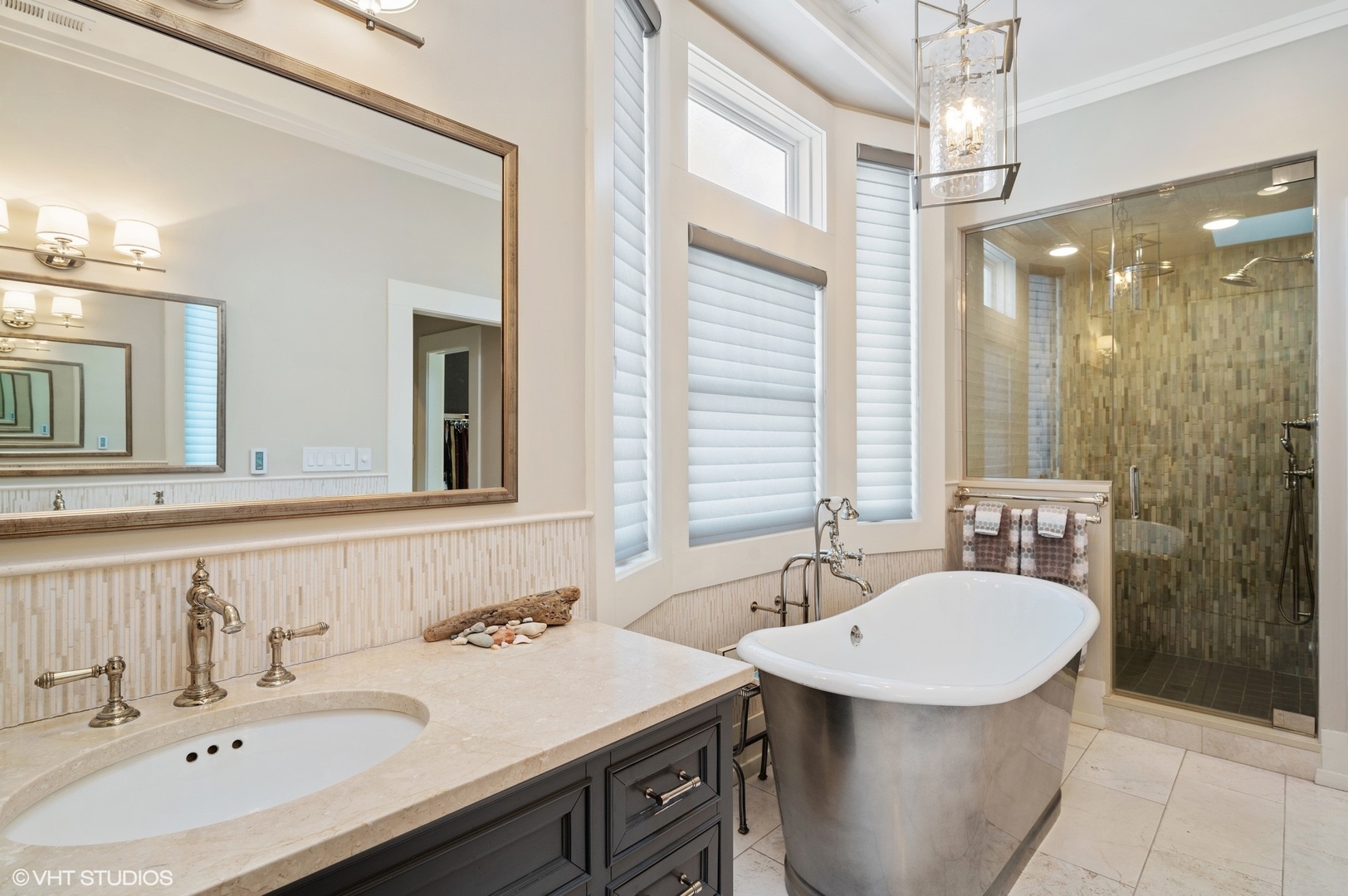 412 Central Avenue Wilmette, IL 60091 - Photo 30 of 69 a bathroom with a sink double vanity and a mirror