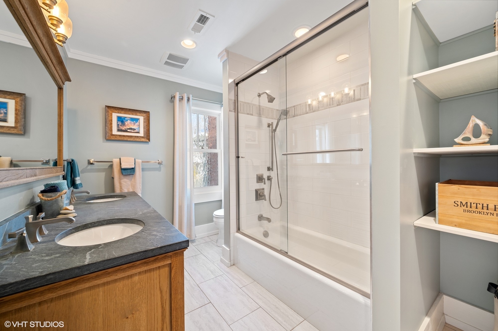 412 Central Avenue Wilmette, IL 60091 - Photo 37 of 69 a bathroom with a granite countertop sink mirror bathtub and shower