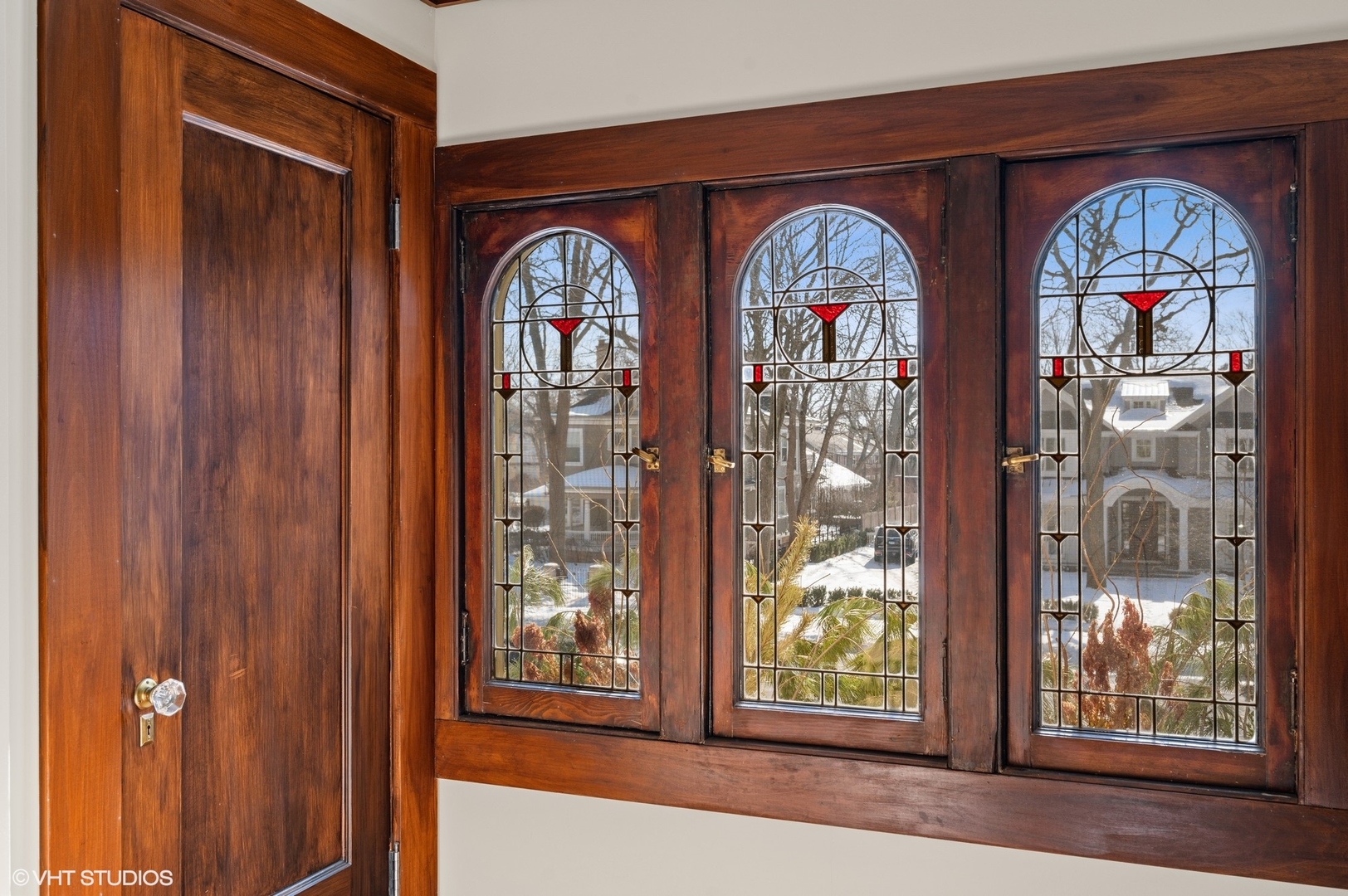 412 Central Avenue Wilmette, IL 60091 - Photo 40 of 69 a front view of a house with lots of windows and door