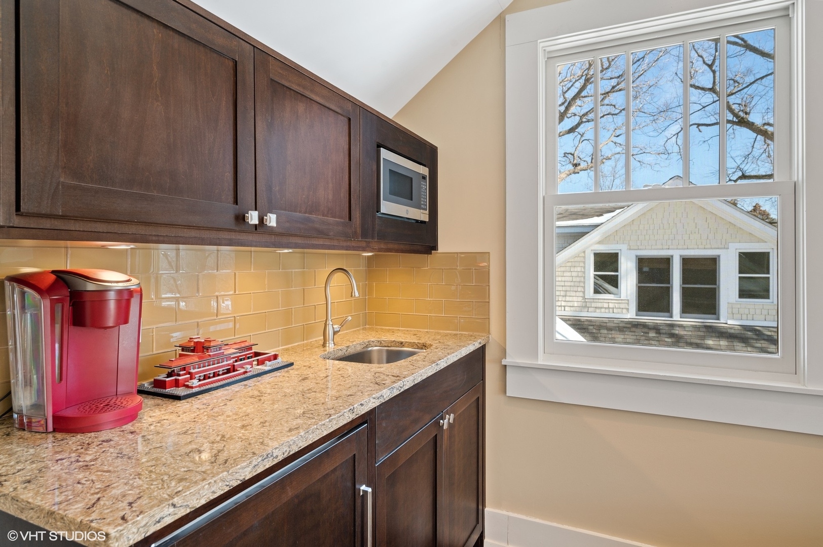 412 Central Avenue Wilmette, IL 60091 - Photo 44 of 69 a kitchen with stainless steel appliances granite countertop a sink stove and cabinets