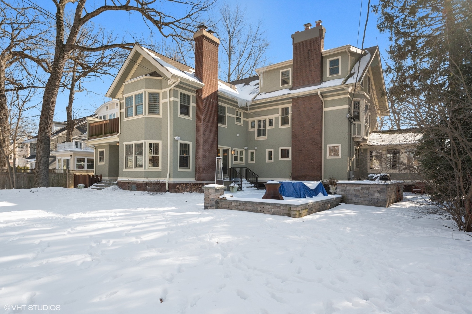 412 Central Avenue Wilmette, IL 60091 - Photo 59 of 69 a view of a building with barbeque grill and a fireplace