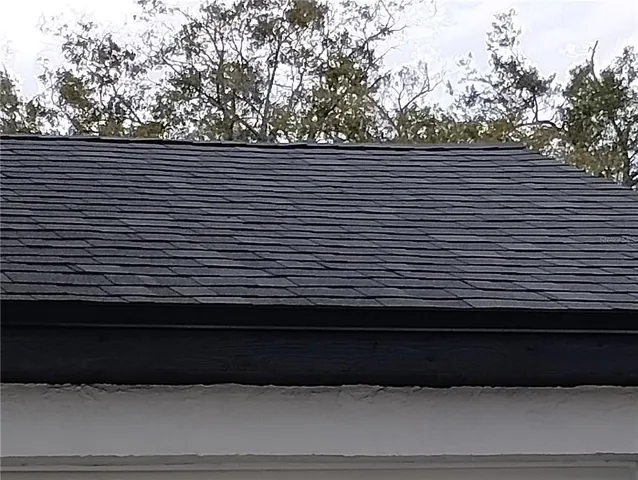 a view of a balcony with a wooden fence