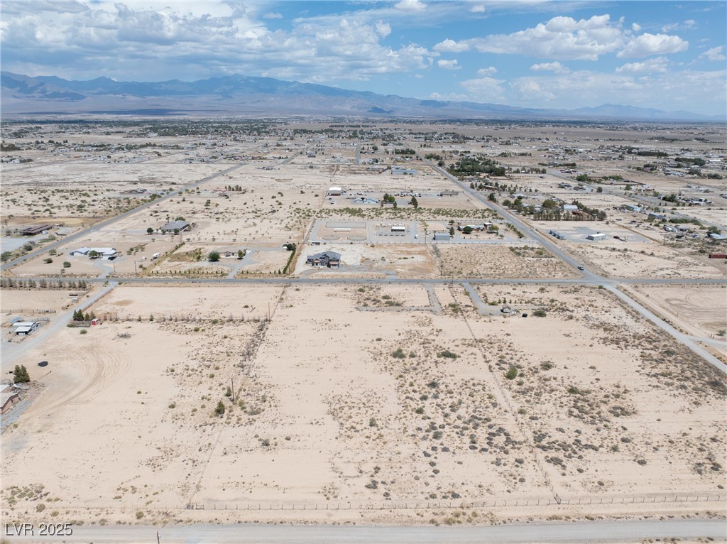 1400 South Warren Street Pahrump, NV 89048 - Photo 18 of 20 Bird's eye view of a mountainous background and a desert landscape towards the East