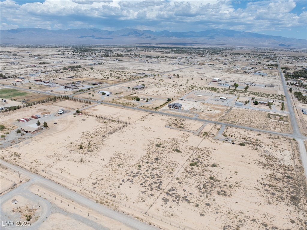 1400 South Warren Street Pahrump, NV 89048 - Photo 19 of 20 View of rural area with a desert landscape and a mountainous background