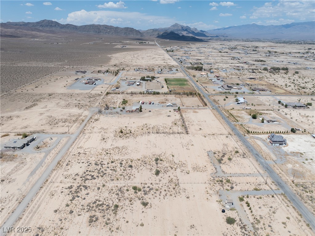 1400 South Warren Street Pahrump, NV 89048 - Photo 20 of 20 Drone / aerial view of mountains and a desert landscape