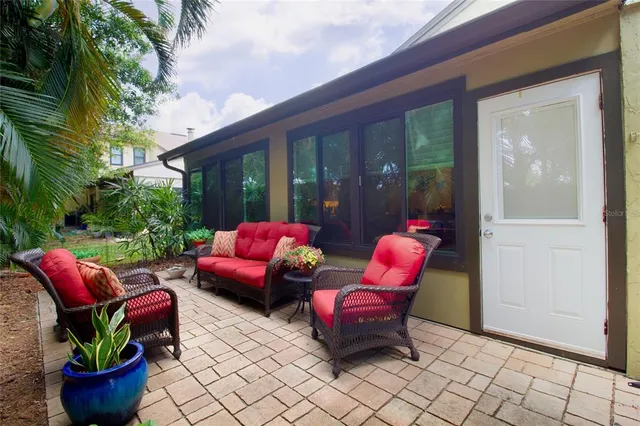 a outdoor living space with furniture and garden view