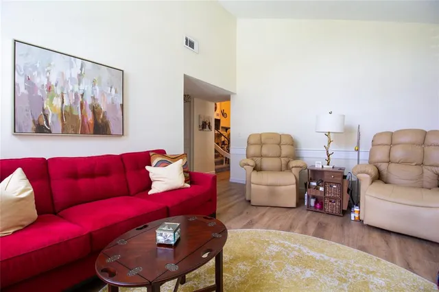 a living room with furniture and a couch