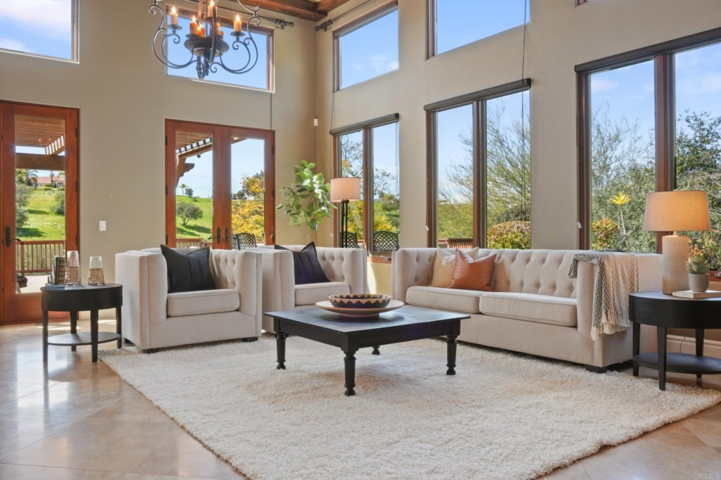 4205 Bridlewood Road Fallbrook, CA 92028 - Photo 15 of 59 a living room with furniture and a large window