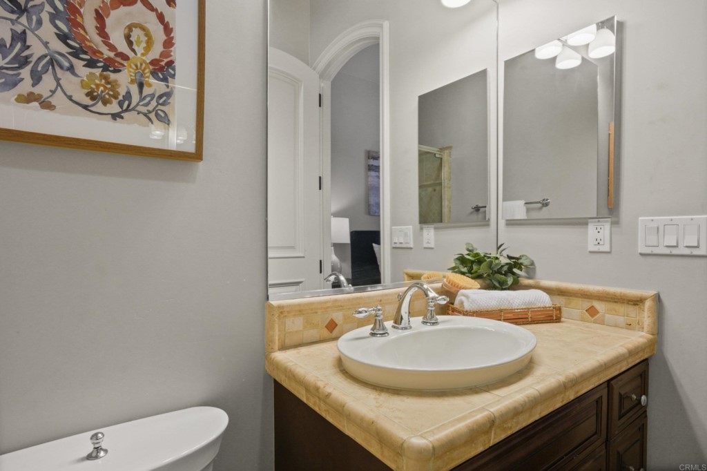 4205 Bridlewood Road Fallbrook, CA 92028 - Photo 28 of 59 a bathroom with a sink and a toilet