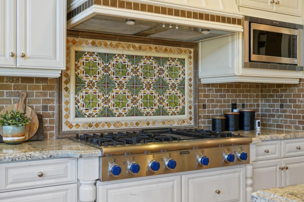 4205 Bridlewood Road Fallbrook, CA 92028 - Photo 10 of 59 a kitchen with stainless steel appliances granite countertop a stove and a sink