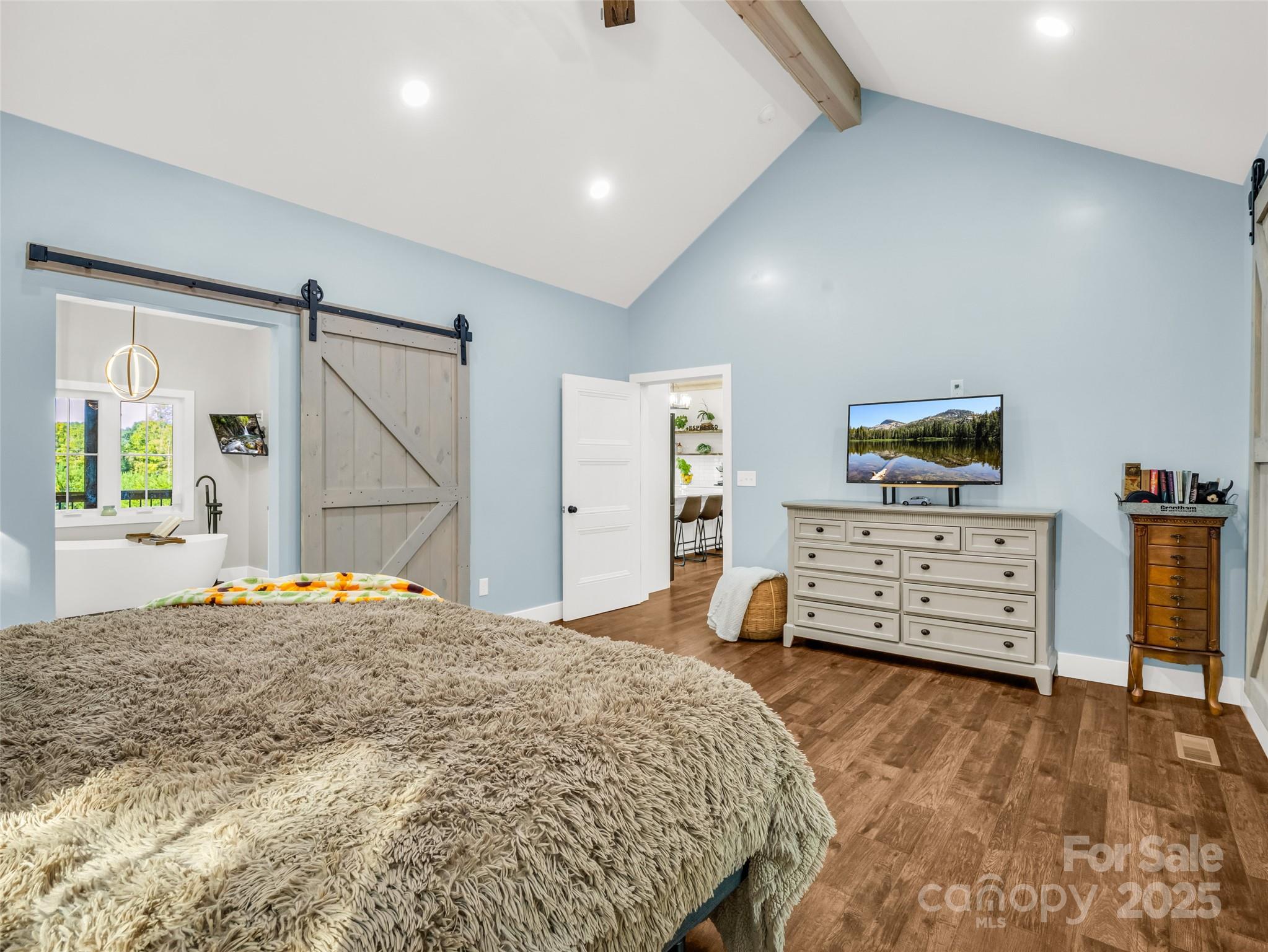 110 Geebees Way Mill Spring, NC 28756 - Photo 23 of 48 a bedroom with a bed and furniture