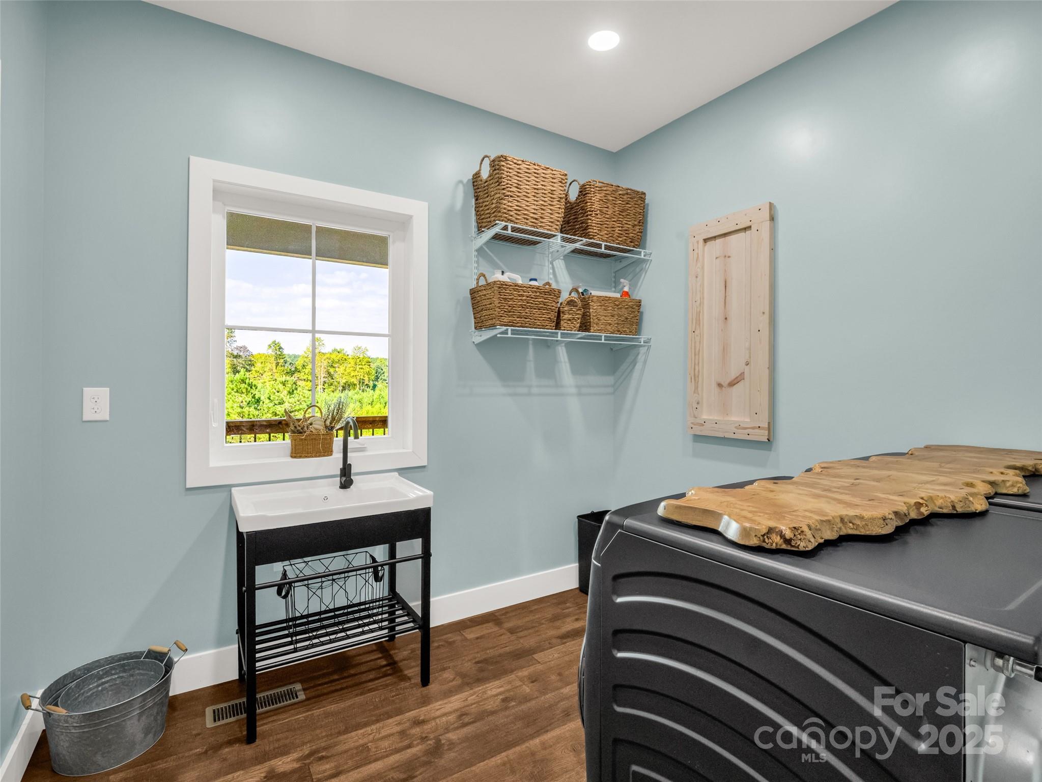 110 Geebees Way Mill Spring, NC 28756 - Photo 32 of 48 a bedroom with a bed and a window