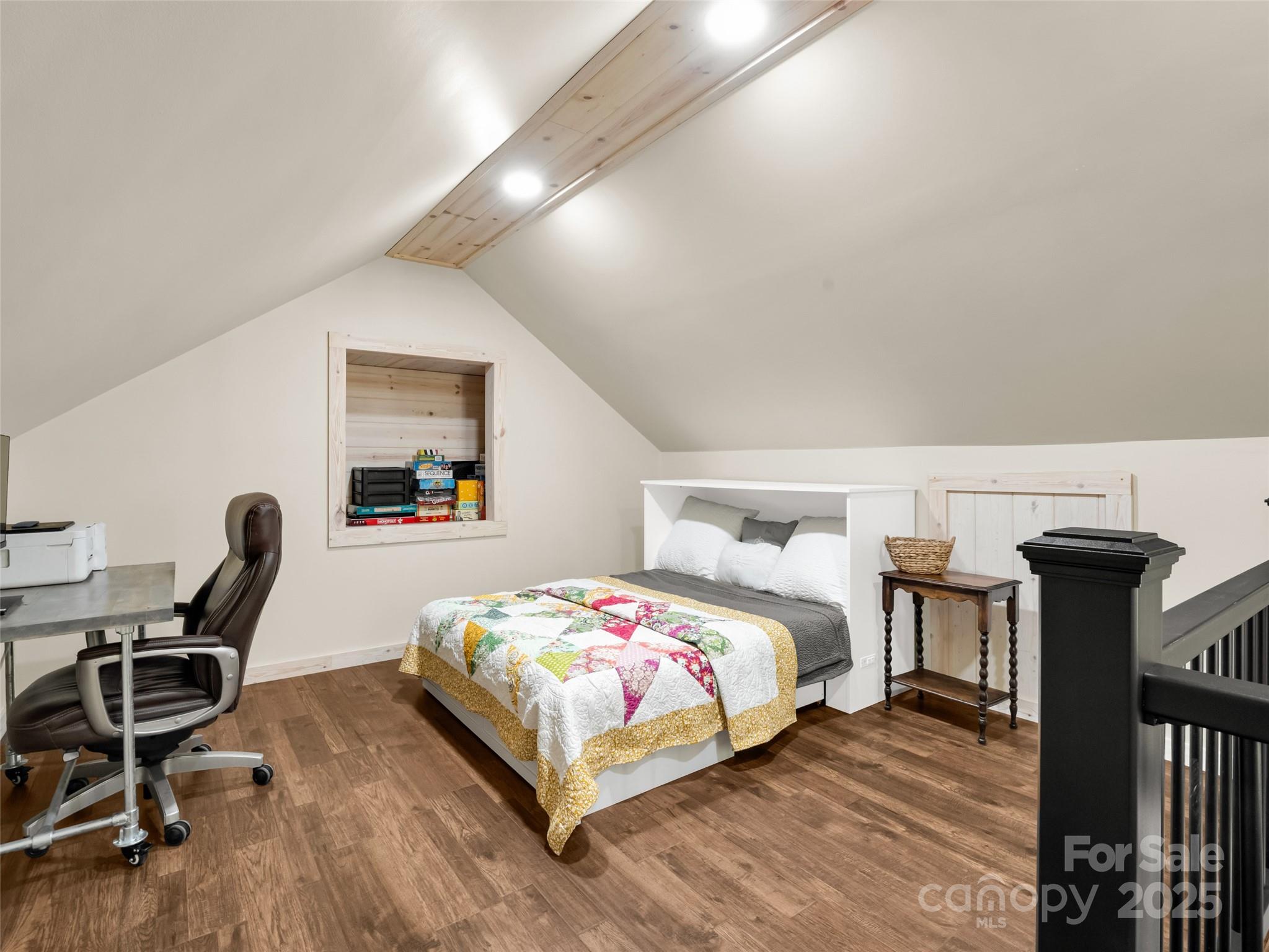 110 Geebees Way Mill Spring, NC 28756 - Photo 33 of 48 a bedroom with a bed and wooden floor