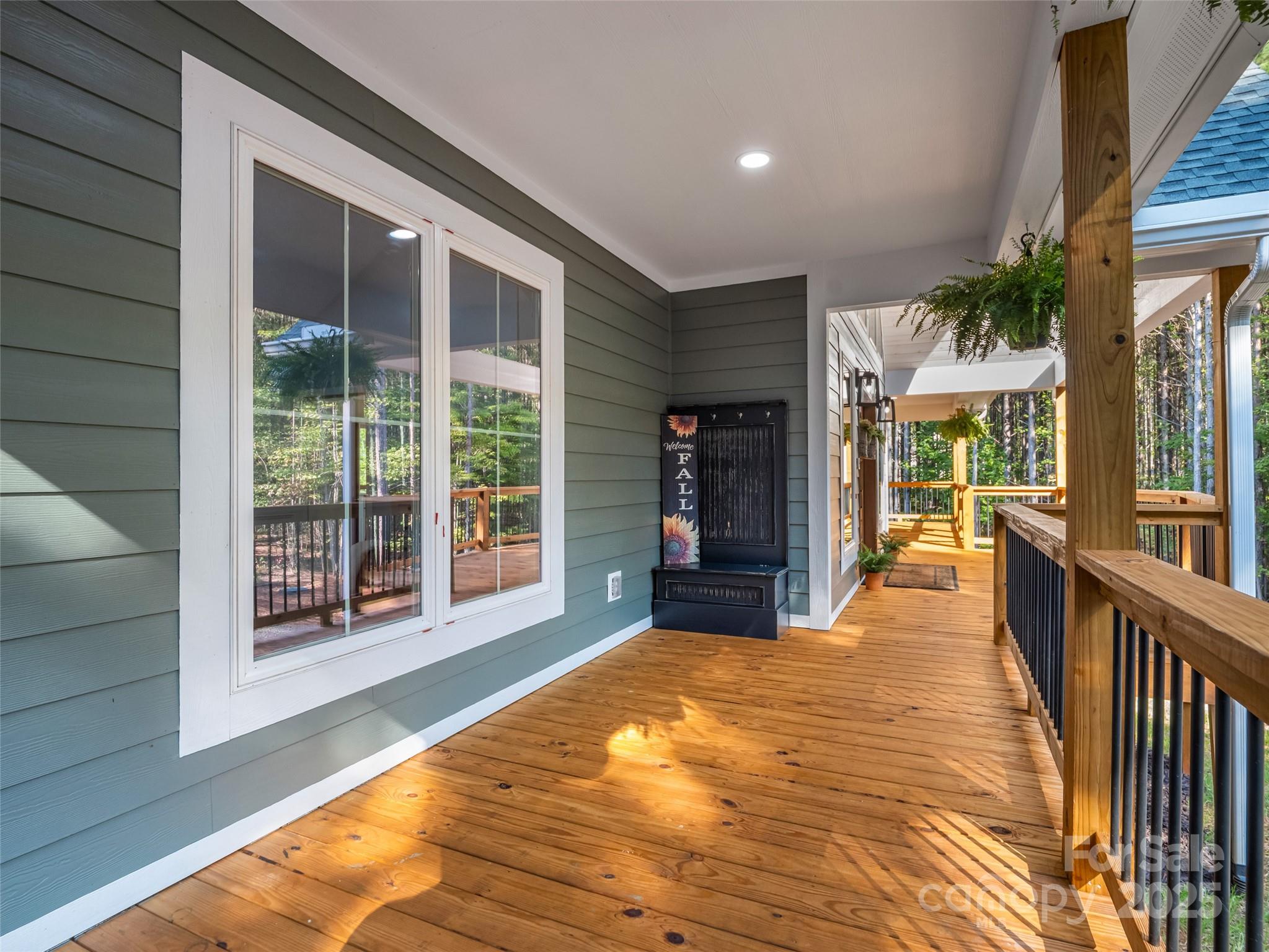 110 Geebees Way Mill Spring, NC 28756 - Photo 7 of 48 a view of a living room and balcony