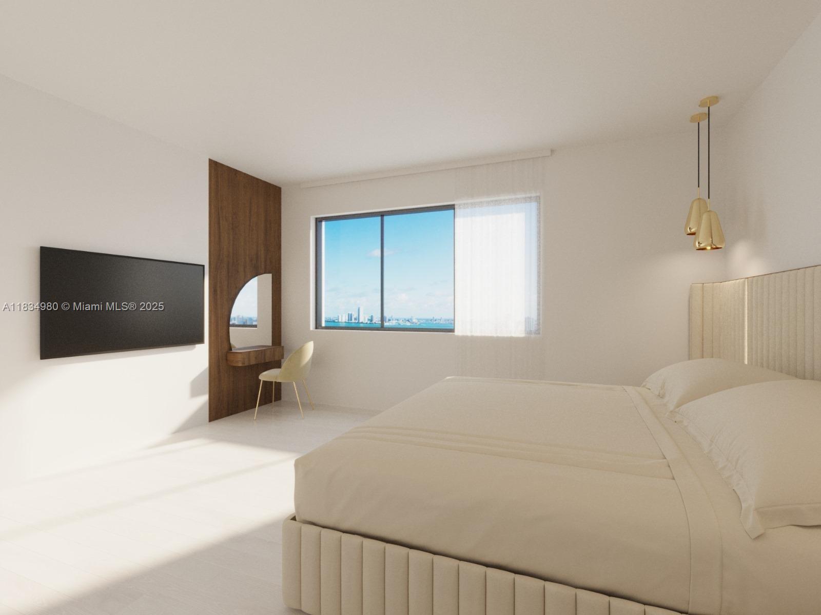 2301 Collins Avenue, Unit 415 Miami Beach, FL 33139 - Photo 4 of 23 a bedroom with a bed and a television