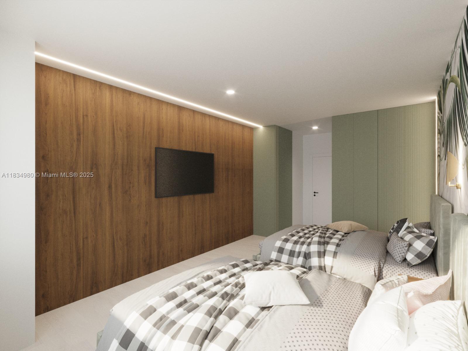 2301 Collins Avenue, Unit 415 Miami Beach, FL 33139 - Photo 5 of 23 a bedroom with a bed and a bathroom