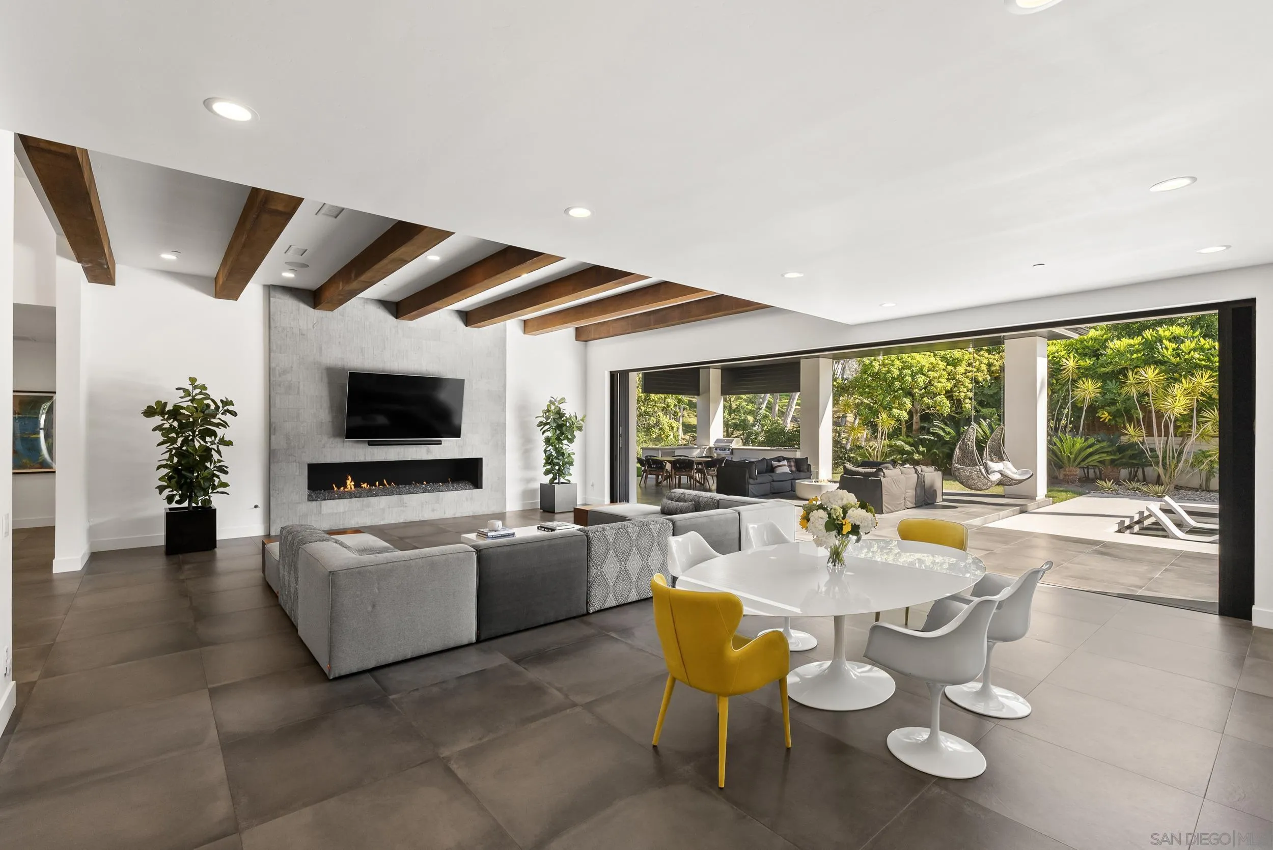 6850 Avenida De La Ronda Rancho Santa Fe, CA 92067 - Photo 11 of 40 a living room with furniture and a flat screen tv