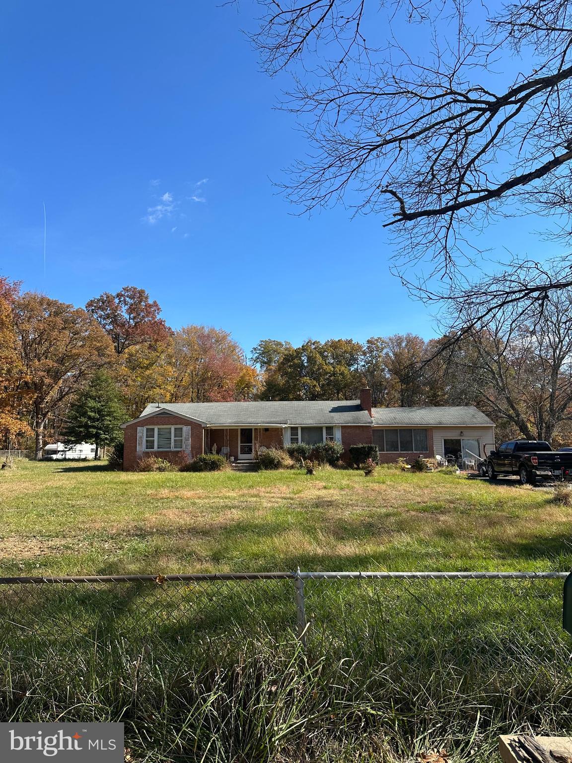 16122 Thoroughfare Road Haymarket, VA 20169 - Photo 2 of 34 a view of a lake with houses in the background