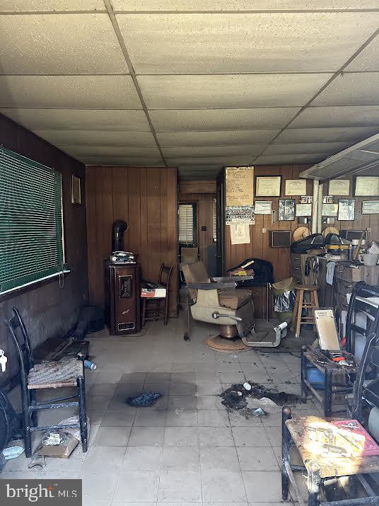 16122 Thoroughfare Road Haymarket, VA 20169 - Photo 34 of 34 a living room with furniture a window and gym equipment