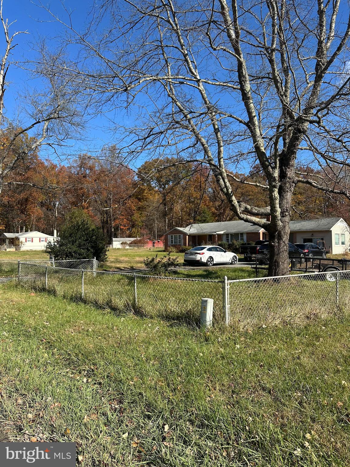 16122 Thoroughfare Road Haymarket, VA 20169 - Photo 4 of 34 a view of a lake with a house in the background