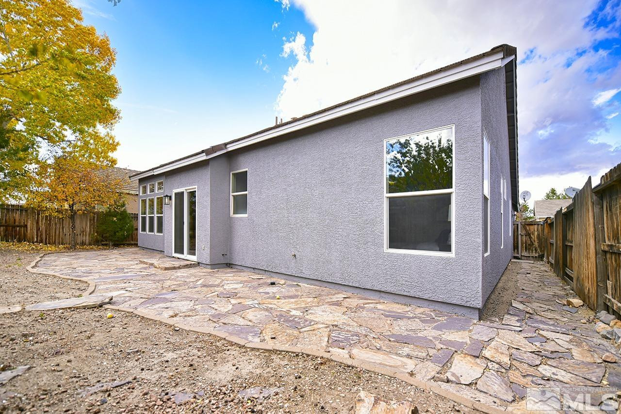 1680 Caliterra Way Reno, NV 89521 - Photo 34 of 34 a view of a house with a yard