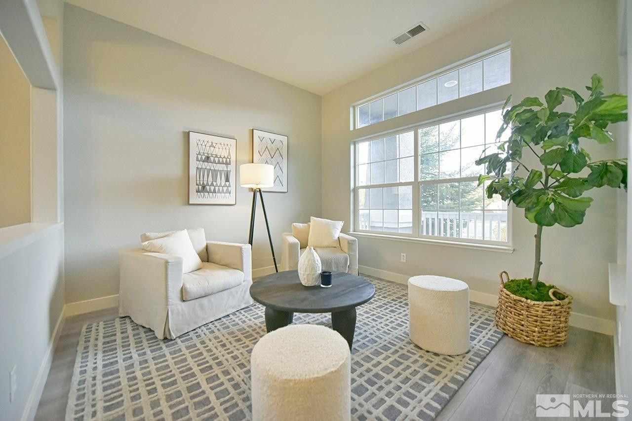 1680 Caliterra Way Reno, NV 89521 - Photo 5 of 34 a living room with furniture and a window