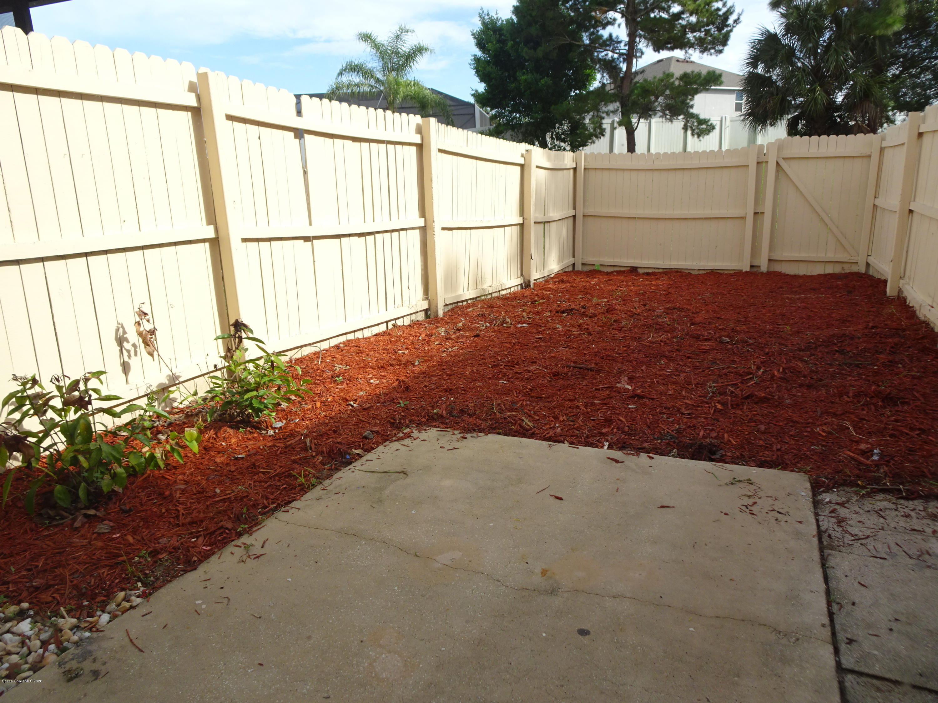 4875 Sisson Road Titusville, FL 32780 - Photo 12 of 14 a view of a backyard