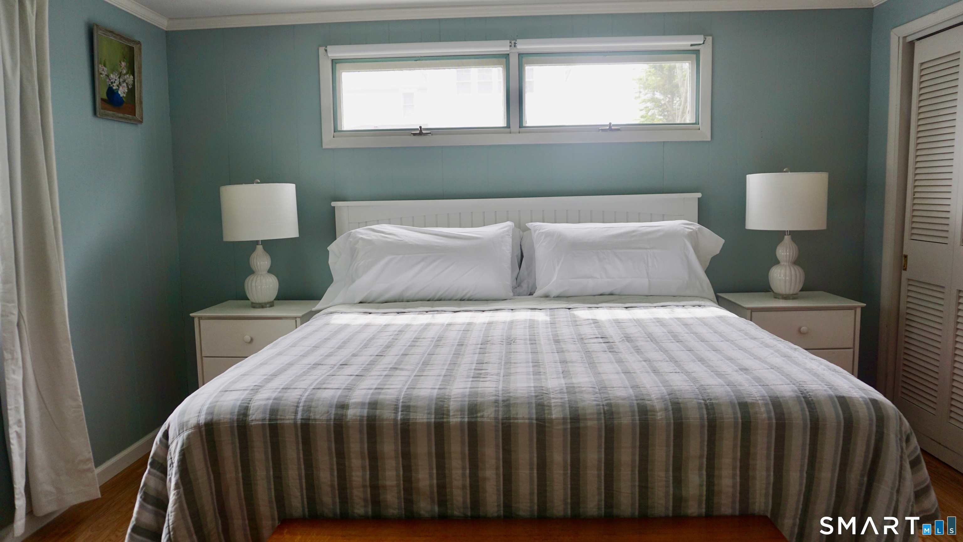 13 Pacific Street Groton, CT 06340 - Photo 28 of 31 a bedroom with a bed and window