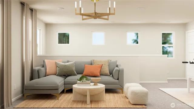 a living room with furniture and a rug