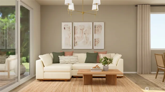 a living room with furniture and a painting on the wall