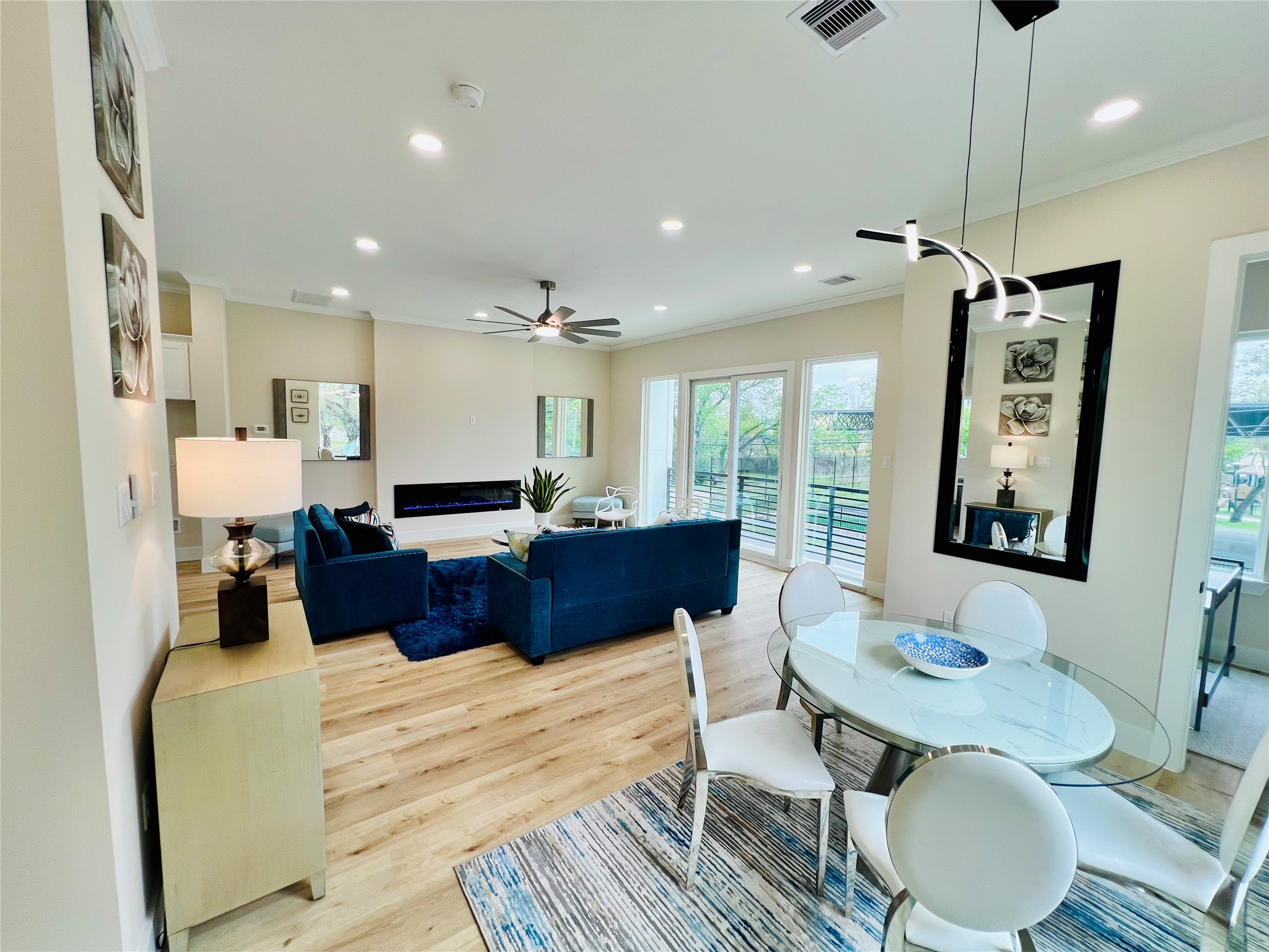3233 Tuam Street Houston, TX 77004 - Photo 12 of 46 a living room with furniture a couch and a chandelier